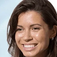 Smiling Auraglow Teeth Whitening Kit user showing whitened teeth